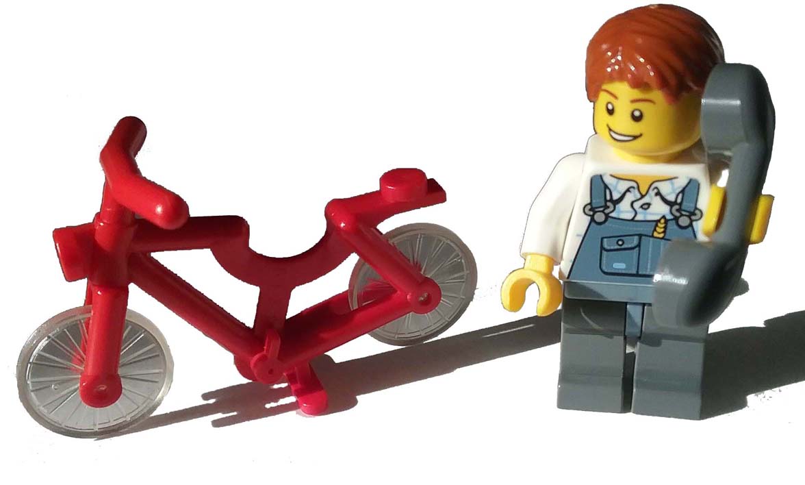 lego boy on phone with bycicle.