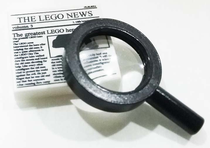 magnifying glass with lego news